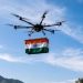 भारतीय डाक विभाग की अनूठी पहल, हिमाचल में पहली बार ड्रोन से पहुंचाया तिरंगा, पूर्व सैनिक को मिला राष्ट्रध्वज